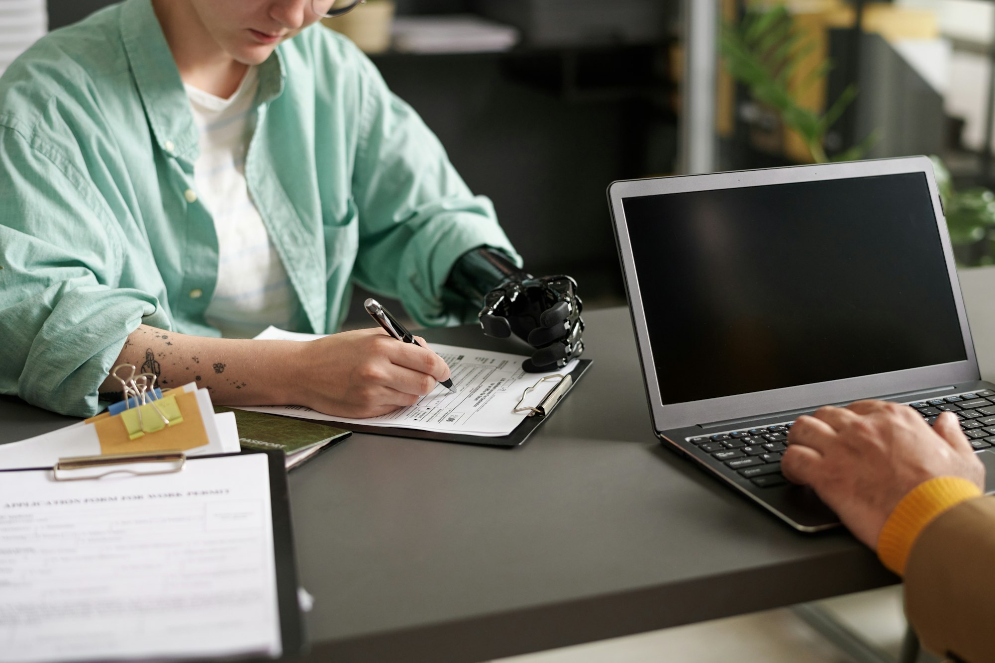 Woman filing document in office